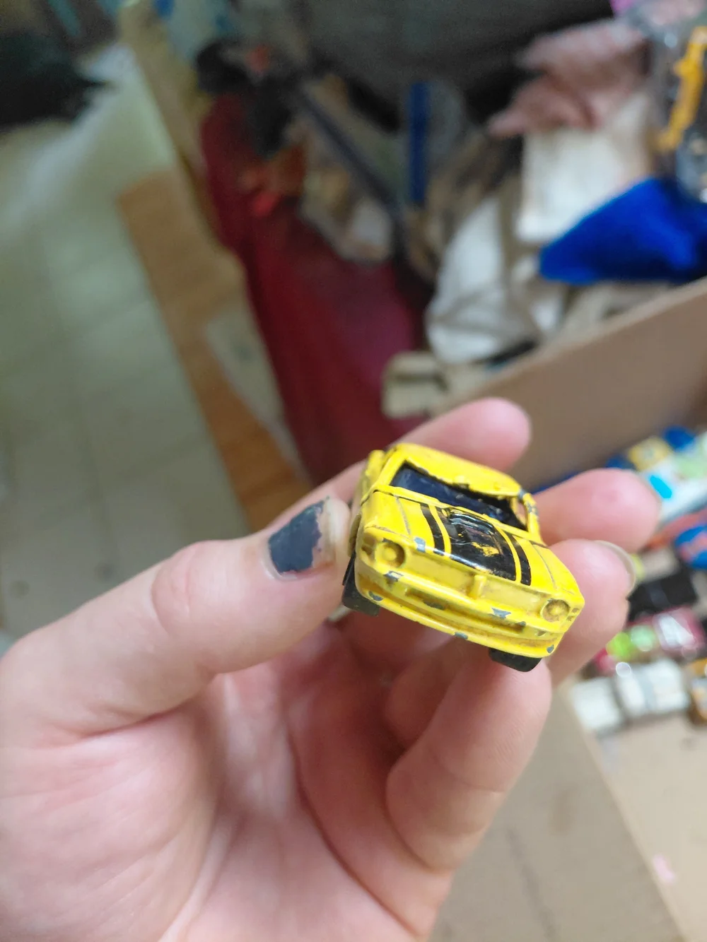 1:64 scale die-cast model of a 1970 Ford Mustang Boss 302,